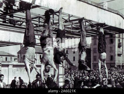 The death of Benito Mussolini, the Italian fascist dictator. body of Mussolini (second from left) next to Clara Petacci (middle) and other executed fascists, in Piazzale Loreto, Milan, April 1945 Stock Photo