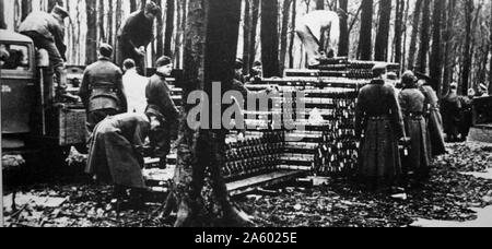 German army unloading supplies during the invasion of Poland in World War Two. 1939 Stock Photo