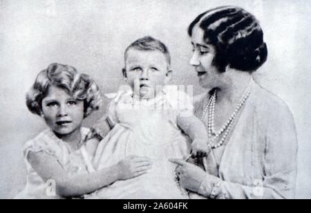Photograph of Queen Elizabeth The Queen Mother (1900-2002) with Princess Elizabeth (1926-) and Princess Margaret (1930-2002). Dated 20th Century Stock Photo