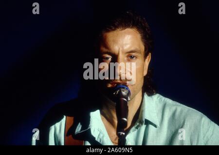French singer-songwriter Francis Cabrel, on stage in 1986. Stock Photo