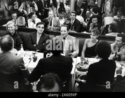 French TV presenter Bernard Pivot celebrating the 500th anniversary of his television show 'Apostrophes' at the Brasserie Lipp, with Jean-Claude Héberlé (CEO of Antenne 2), Dorothée, William Leymergie, Jean-Pierre Foucault and Michel Drucker. September 27, 1985 Stock Photo