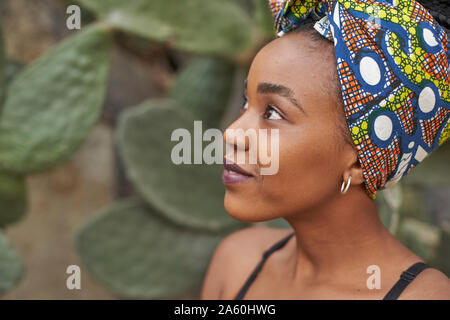 Close up of young woman with headscarf Stock Photo