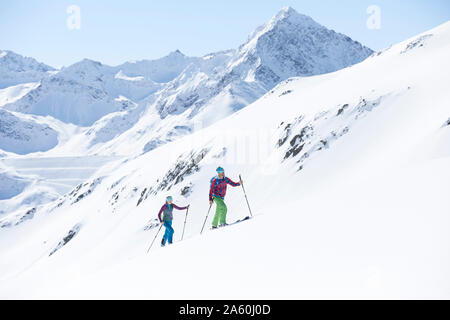 Couple ski touring in the mountains, Kuehtai, Tyrol, Austria Stock Photo