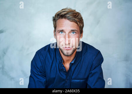 Portrait of confident young man Stock Photo
