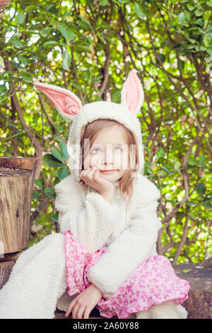 Portrait of little girl wearing Easter bunny costume Stock Photo