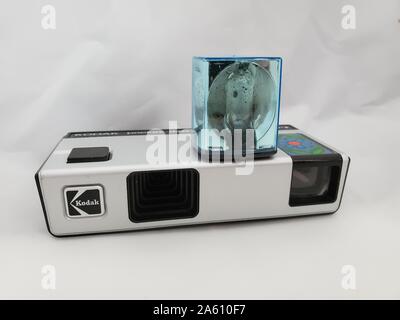 Close-up of Magicube flash cube installed in Kodak Pocket Instamatic 10 vintage camera, ca 1970s, on a white background, September 26, 2019. () Stock Photo