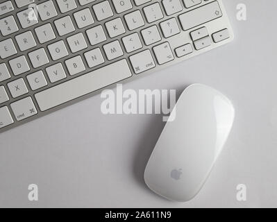UK, October 2019: Apple mac mouse and wireless keyboard on white background Stock Photo