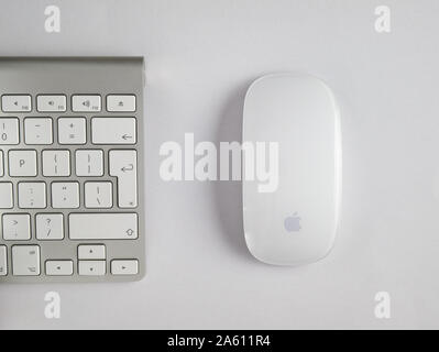 UK, October 2019: Apple mac wireless mouse and keyboard on white background Stock Photo
