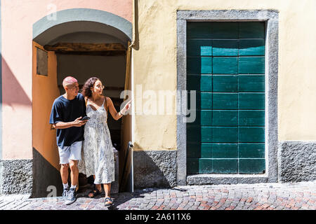 Young couple exploring the city, Lecco, Italy Stock Photo