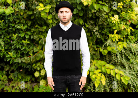 Portrait of young man dressed in black and white Stock Photo