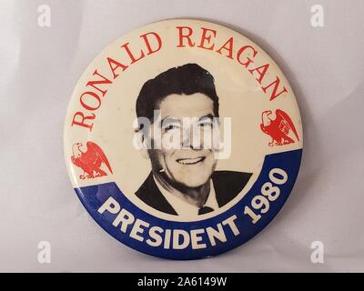 Red, white, and blue campaign pin-back button or badge, with