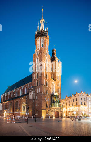 Exterior of Saint Mary's Basilica (Bazylika Mariacka) in Market Square (Rynek Glowny) at night, UNESCO, Krakow, Malopolskie, Poland, Europe