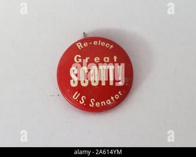 Red and white pin-back button or badge, with the text 'Re-elect