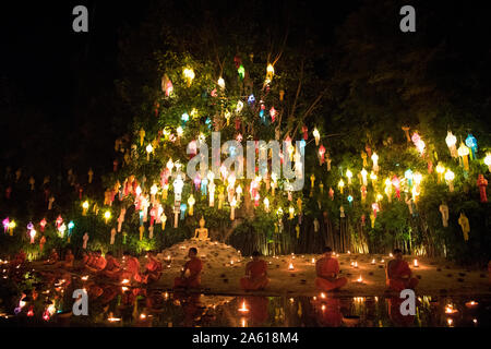 Monks celebrating Loy Krathong with lanterns at Wat Phan Tao, Chiang Mai, Thailand. Stock Photo