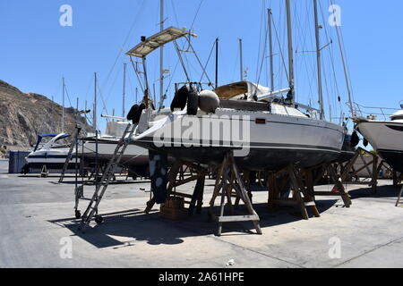 Sailing boat on the hardstanding in Aguadulce marina boat yard, Aguadulce, Almeria, Spain Stock Photo