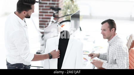 menswear designers working in the Studio. Stock Photo