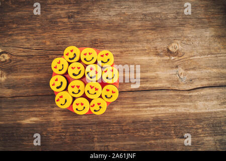 many delicious cupcakes on a wooden background with aline. Stock Photo