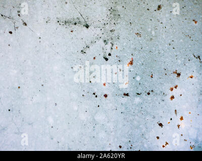 rust points on a blue background. blue wall texture deteriorated with rust points. Texture of painted grey metal with corrosion points.  Stock Photo
