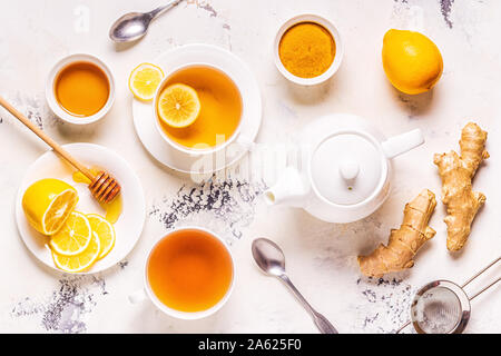 Green tea with lemon and honey, Immunity boosting and cold remedies, top view. Stock Photo