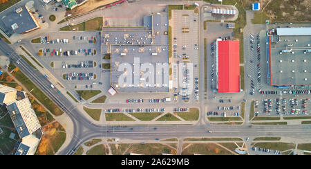 Supermarket with parking above top drone view. Shopping theme Stock Photo