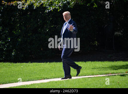 Washington, United States Of America. 23rd Oct, 2019. United States President Donald J. Trump waves to the media as he departs the White House in Washington, DC for a trip to Pittsburgh, Pennsylvania on Wednesday, October 23, 2019. Credit: Ron Sachs/CNP | usage worldwide Credit: dpa/Alamy Live News Stock Photo
