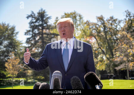 Washington, United States Of America. 23rd Oct, 2019. United States President Donald J. Trump makes a statement as he departs the White House in Washington, DC for a trip to Pittsburgh, Pennsylvania on Wednesday, October 23, 2019. Credit: Ron Sachs/CNP | usage worldwide Credit: dpa/Alamy Live News Stock Photo