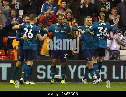 Hull City's Josh Magennis (centre) celebrates scoring his side's first goal of the game during the Sky Bet Championship match at The City Ground, Nottingham. Stock Photo