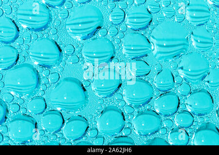 Blue swimming pool water drops and bubbles detail Stock Photo