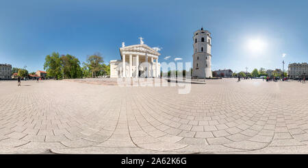 360 degree panoramic view of VILNIUS, LITHUANIA - MAY, 2019: Full spherical seamless panorama 360 degrees angle on central square of old town with church and tower in equirectangu