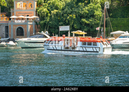 SORRENTO, ITALY - AUGUST 2019: tender vessel from the cruise ship Silver Shadow leaving Sorrento harbour with passengers on board. Stock Photo