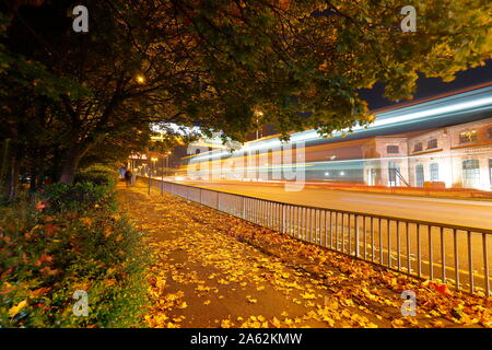 Light trails from a passing bus on Wellington Road in Leeds. Stock Photo