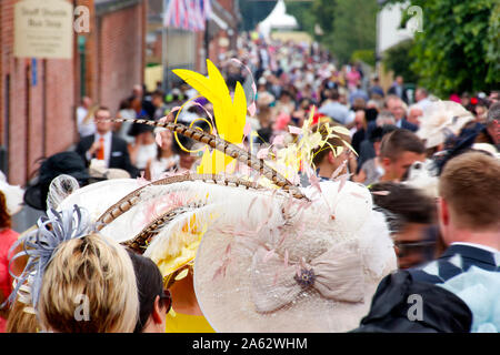 Crowd of people and British hats at Horse race event Royal Ascot London UK Stock Photo