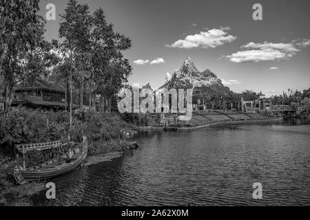 Orlando, Florida. April  29, 2019 Colorful boat , blue lake and Expedition Everest mountain in Animal Kingdom Stock Photo