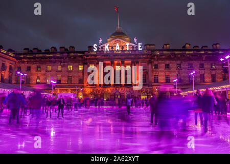 Ice skating activity on the winter ice rink in Christmas week, Somerset House, London, England, United Kingdom, Europe Stock Photo