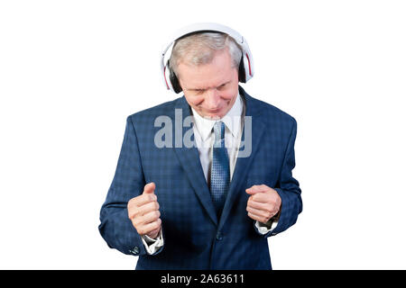 An elderly man in a suit, and headphones. Isolated on a white background. Stock Photo