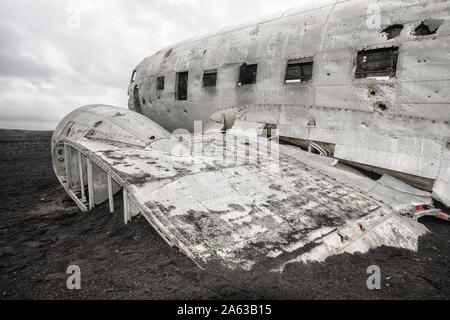 wreck of Douglas DC-3 resting at Black Beach in Iceland Stock Photo