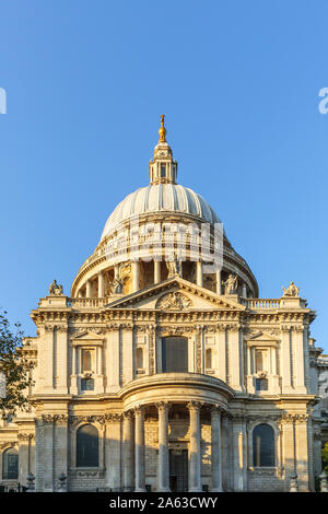 View from St Paul's Churchyard of the London landmark, historic St Paul's Cathedral and dome designed by Sir Christopher Wren on a sunny autumn day