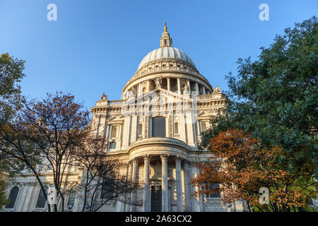 View from St Paul's Churchyard of the London landmark, historic St Paul's Cathedral and dome designed by Sir Christopher Wren on a sunny autumn day Stock Photo