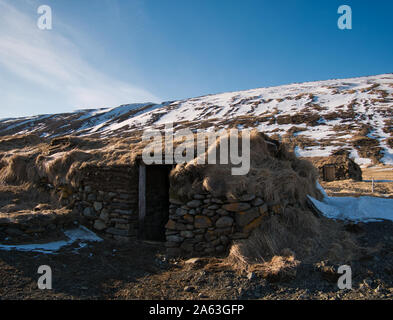 The entrance to a well-preserved peat house in Iceland Stock Photo