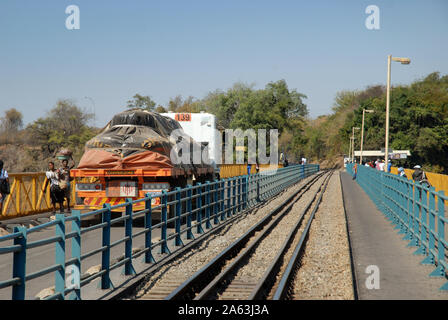 Lorry transporting goods on the Victoria Falls Bridge over the Zambezi River, from Zimbabwe to Zambia, Africa. Stock Photo