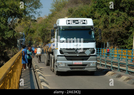 Lorry transporting goods on the Victoria Falls Bridge over the Zambezi River, from Zimbabwe to Zambia, Africa. Stock Photo