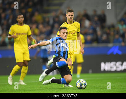 Milan, Italy. 23rd Oct, 2019. FC Inter's Lautaro Martinez (Front) scores during the UEFA Champions League Group F soccer match between FC Inter and Borussia Dortmund in Milan, Italy, Oct. 23, 2019. Credit: Alberto Lingria/Xinhua/Alamy Live News Stock Photo