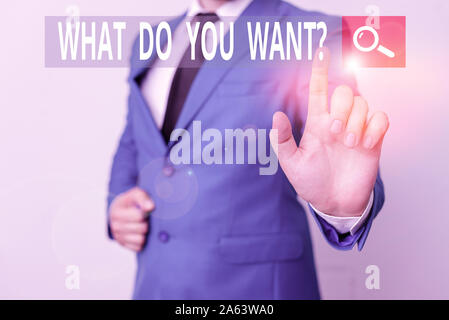 Conceptual hand writing showing What Do You Want Question. Concept meaning say or write in order to ask demonstrating about something Businessman with Stock Photo