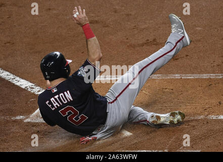 Houston, United States. 23rd Oct, 2019. Washington Nationals Adam Eaton scores on a double by Anthony Rendon against the Houston Astros in the first inning of Game 2 of the World Series at Minute Maid Park in Houston, Texas on Wednesday, October 23, 2019. The Nationals lead the best-of-seven series 1-0. Photo by Trask Smith/UPI Credit: UPI/Alamy Live News Stock Photo