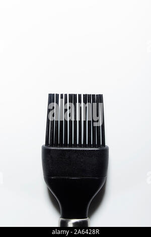 Black kitchen silicone brush on a white background Stock Photo