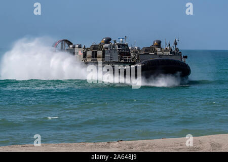 US Navy An Land Craft Air Cushion (LCAC) assigned to Assault Craft Unit ...