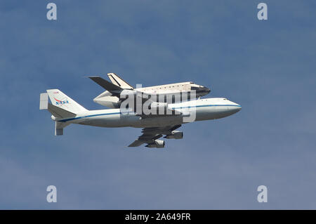 LOS ANGELES, CA. September 21, 2012: The Space Shuttle Endeavour does a flyby over Los Angeles before landing at LAX. © 2012 Paul Smith / Featureflash Stock Photo