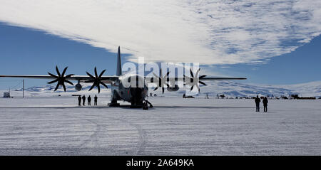 An LC-130 'Skibird' assigned to the New York Air National Guard's 109th Airlift Wing between missions at McMurdo Station, Antarctica, the National Science Foundation research center in Antarctica on Dec. 2, 2018. The 109th Airlift Wing flies the largest ski-equipped aircraft in the world which can land on snow and ice. (Courtesy photo) Stock Photo