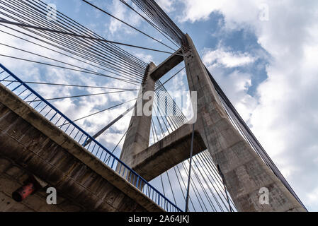 Modern suspension bridge. Detail of tower and steel cables. Barrios de Luna, Castile and Leon, Spain. Stock Photo