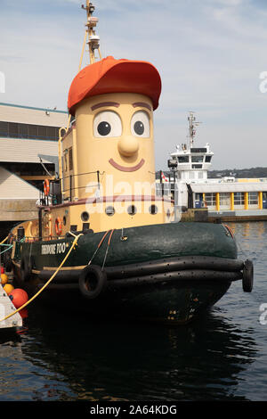 Theodore Tugboat moored in Halifax harbour during Autumn in Canada Stock Photo